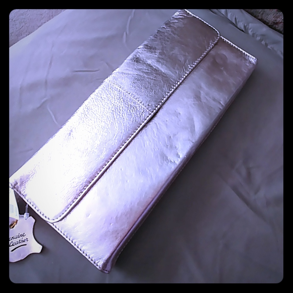 CLOSET CLEAR-OUT!  Silver Leather Clutch NWT